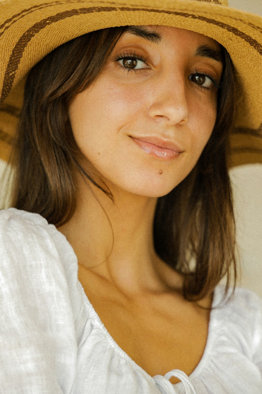 Portrait of a smiling woman with brown hair