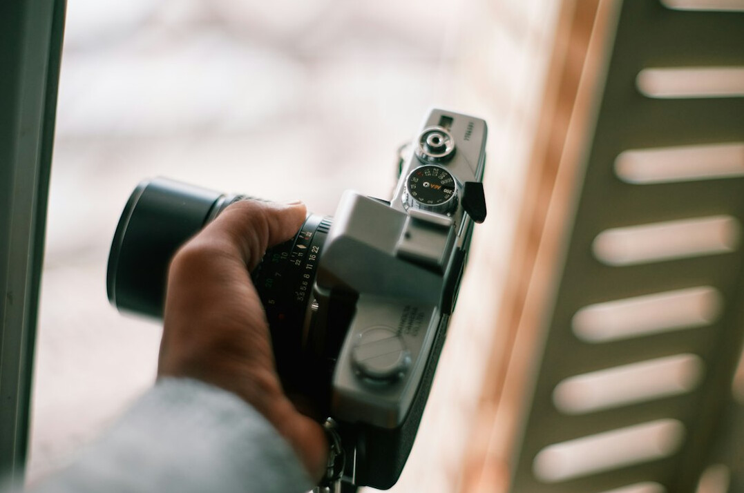 Film camera pointed at a scene for visual checking