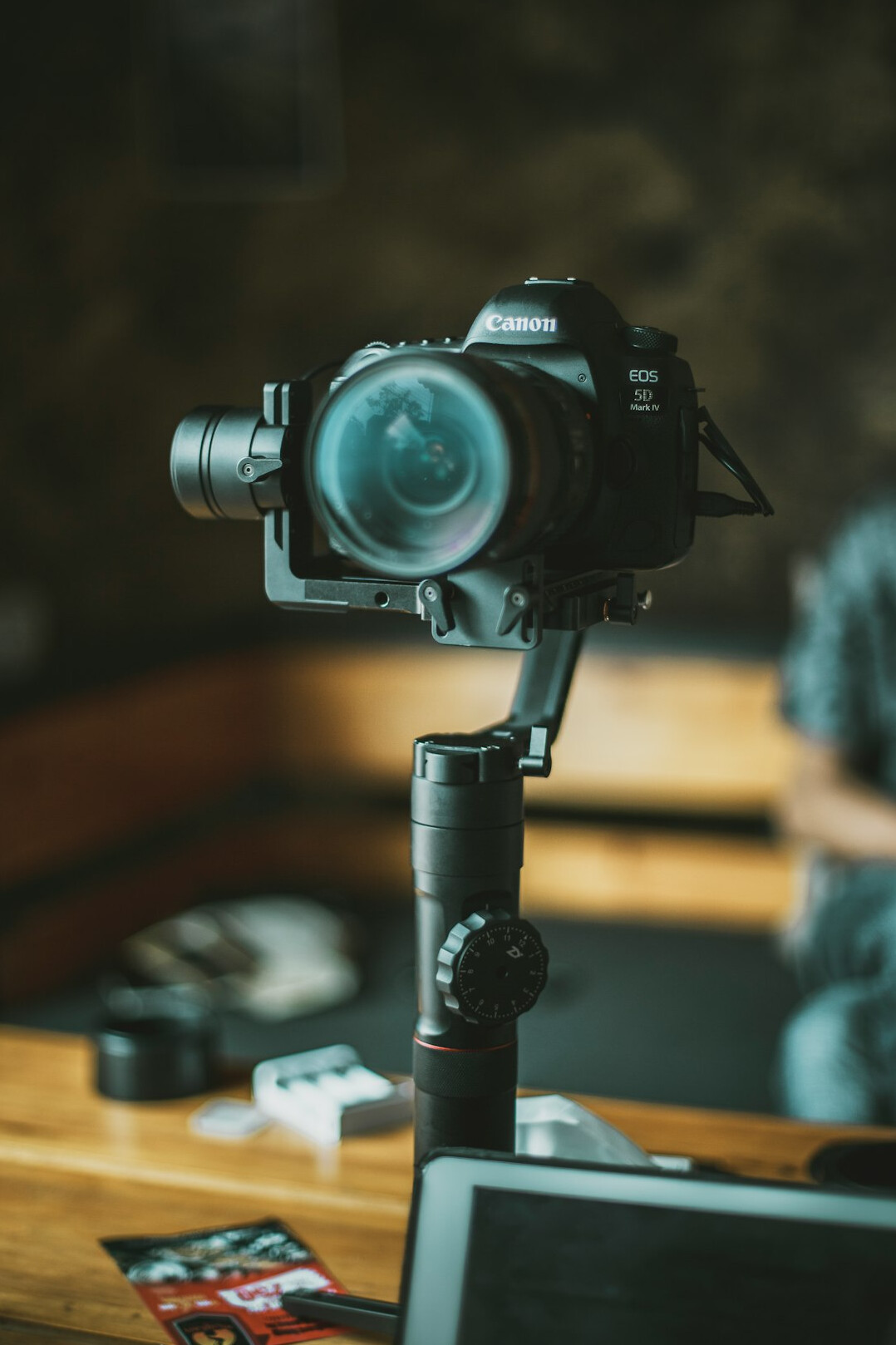 Video production team working with a professional camera in a studio